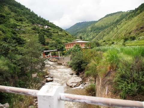 Punakha a restaurant sits by a stream